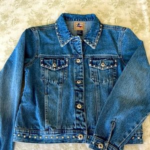 Fabulous studded denim jacket. Never worn, new condition.